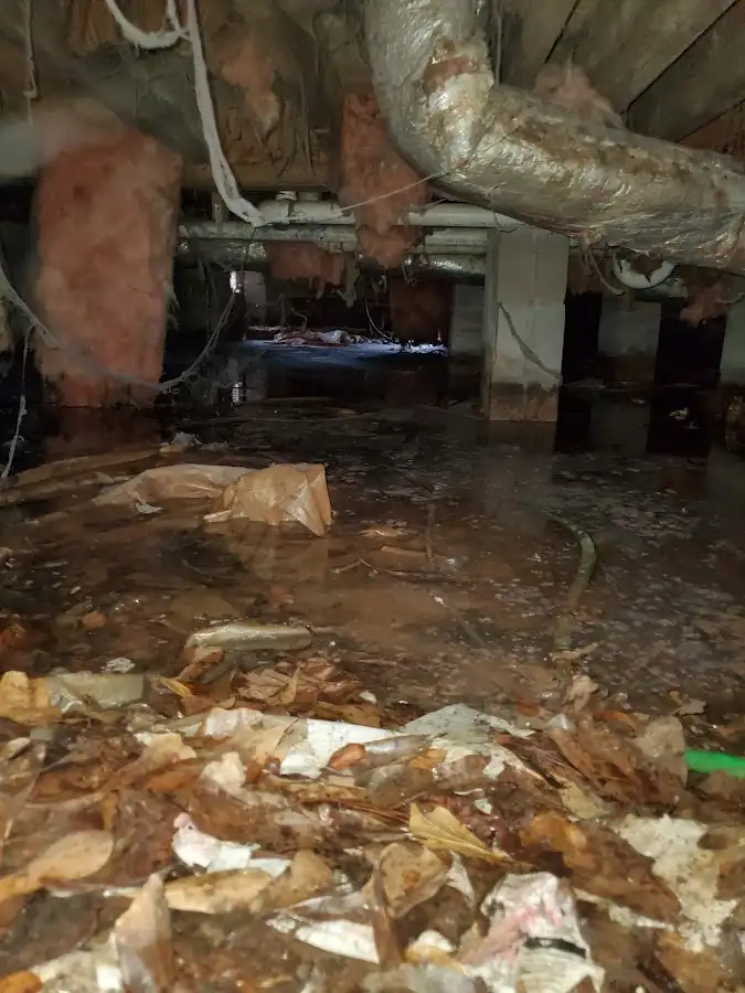 Crawl space flood assessment for Commercial Water Damage Restoration in Manchester