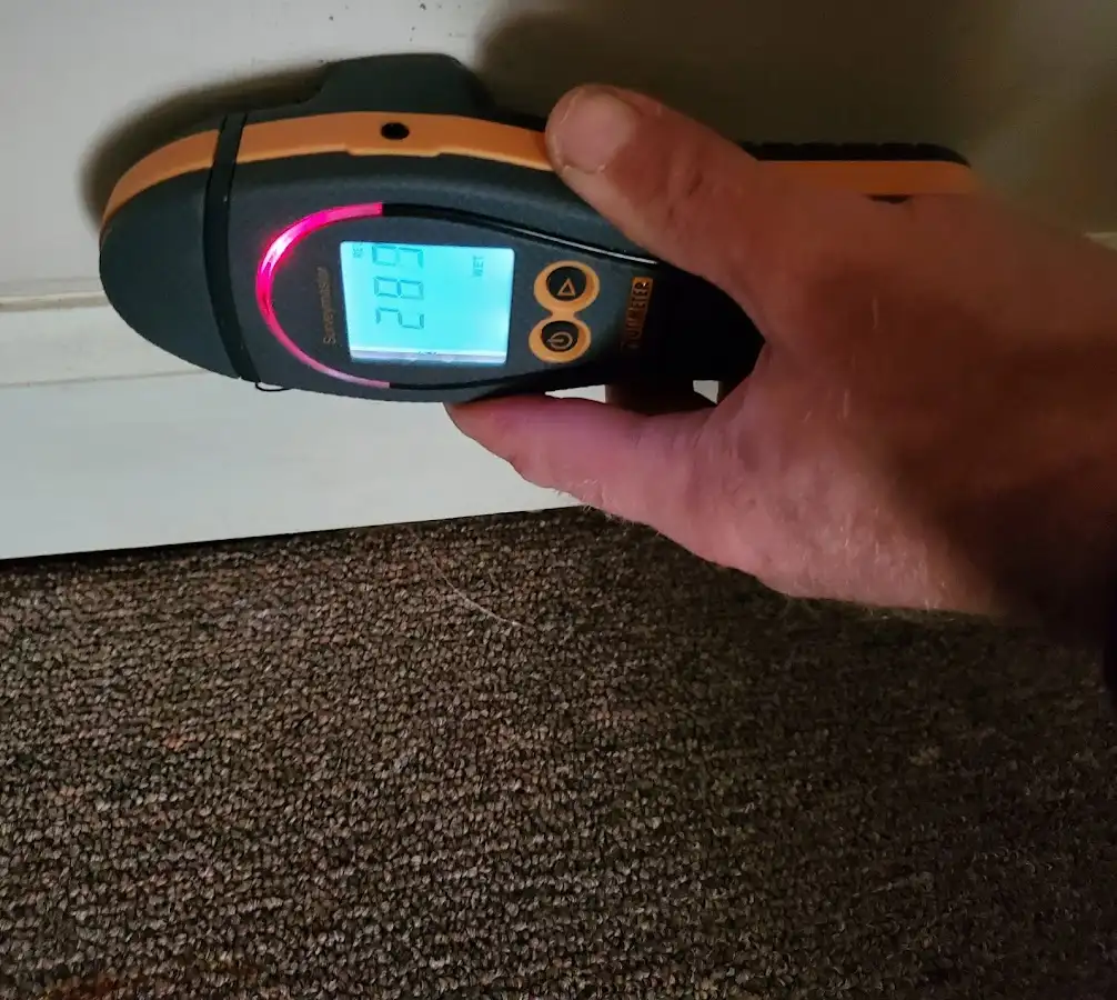 Moisture detection at baseboard during Mold Inspection & Testing in Manchester